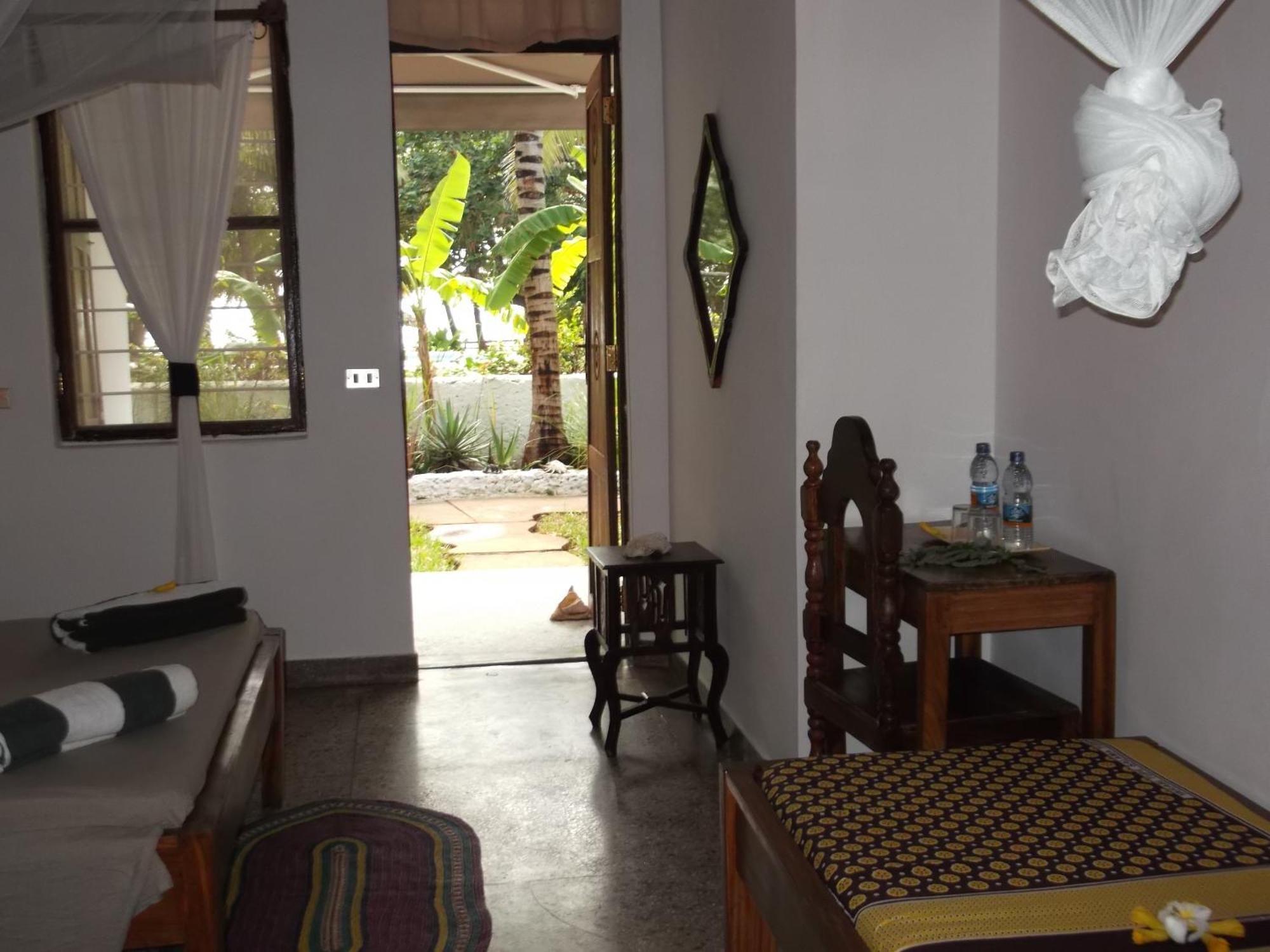 Kobe House Bed and Breakfast Jambiani  Rum bild